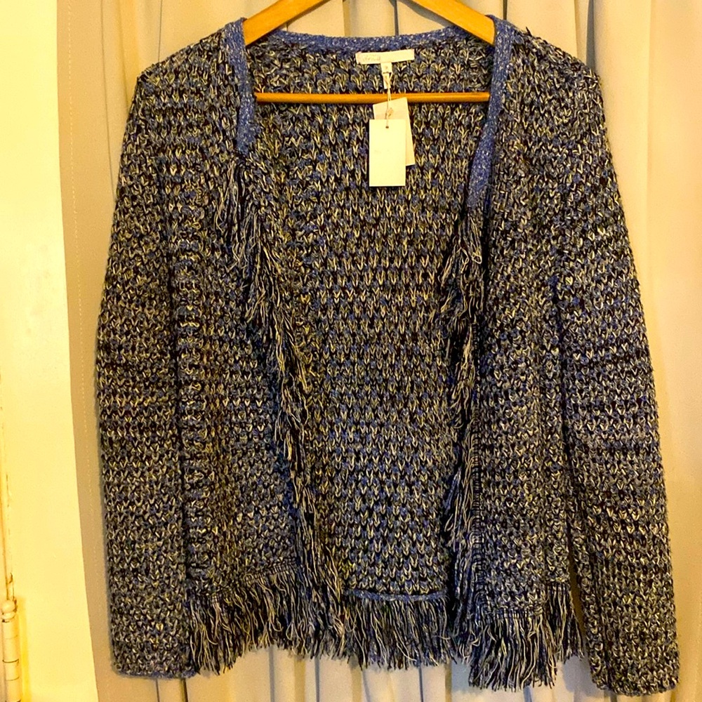 Blue Maje blazer with silver thread weaved through out bordered with fringe.